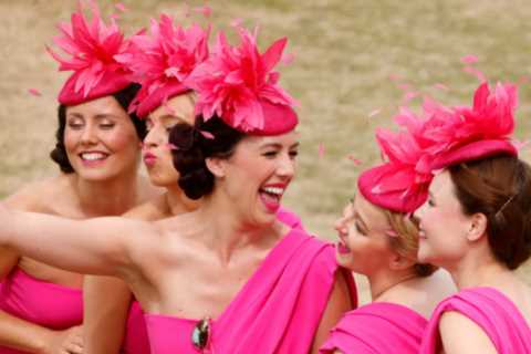 Glammed up racegoers lead the pack in off-the-shoulder gowns and summer brights for Glorious Goodwood’s Ladies Day