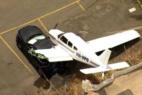 Watch terrifying moment plane crash lands onto racecourse after losing power mid-flight and ploughs into car