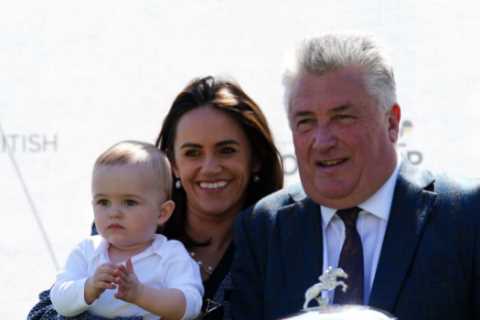 Paul Nicholls celebrates record £3.6m earnings with girlfriend & baby boy as he’s crowned champion trainer for 14th time