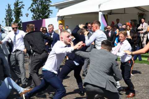 Epsom Derby: Huge fight breaks out at racecourse with boozed-up revellers throwing punches in shocking scenes