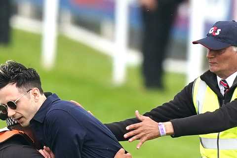 Protestor sprinting on Epsom Derby racecourse tackled as animal activists’ plot to disrupt race is foiled
