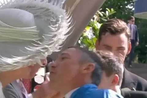 Moment jockey Frankie Dettori breaks Royal protocol by giving Camilla a kiss as he’s swept up in joy of Gold Cup win
